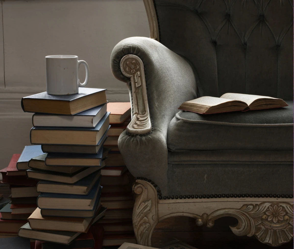 Cozy reading nook with books and chair